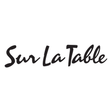 Sur La Table logo written in dark cursive font on a black background.
