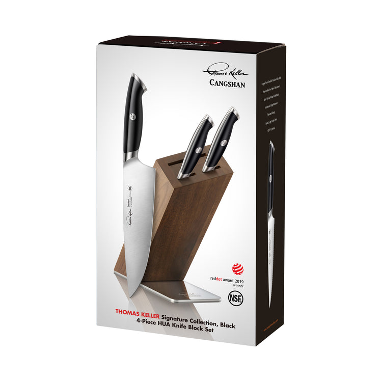 Four-piece knife block set with three knives in a wooden block and one large chef's knife beside it.