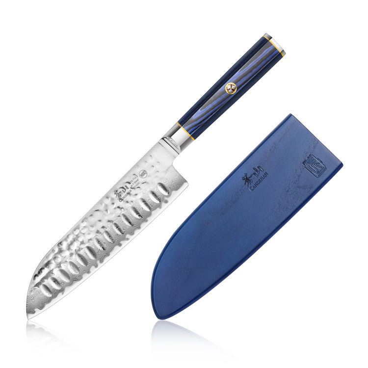 Santoku knife with hammered blade and blue handle next to matching blue sheath.
