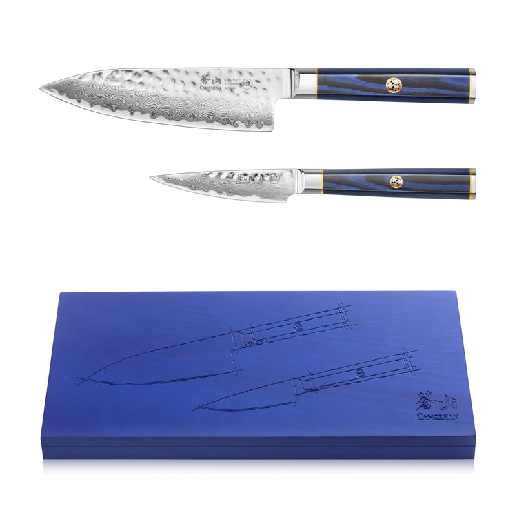 Two blue-handled Damascus steel knives with hammered blades above a blue box featuring knife sketches.