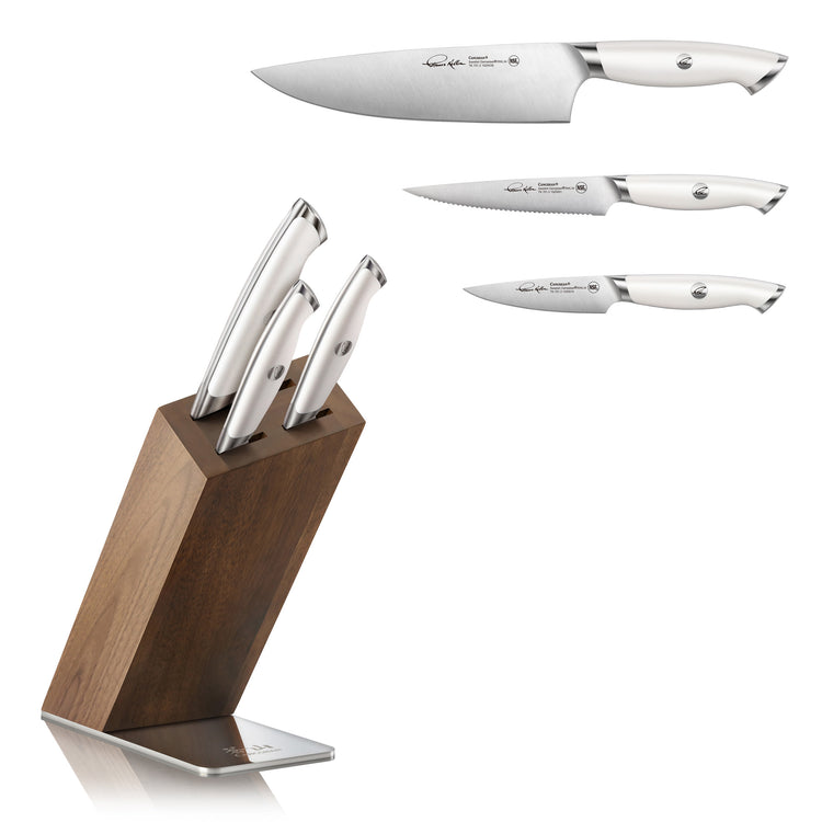 Four-piece knife set with stainless steel blades and white handles, displayed with an angled wooden block stand.