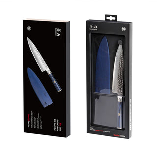 
                    
                      8-inch chef knife with hammered blade and blue sheath in black retail packaging.
                    
                  