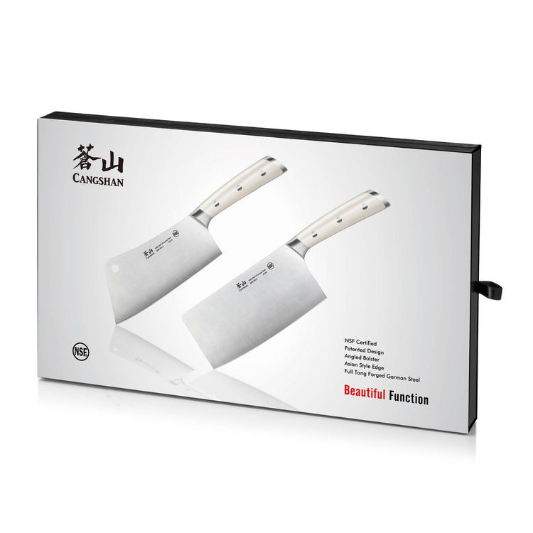 Two cleaver knives with light-colored handles displayed on a white box with black edges and text.
