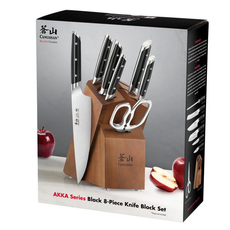 8-piece knife set with black handles in a wooden block, including scissors and a large chef's knife.