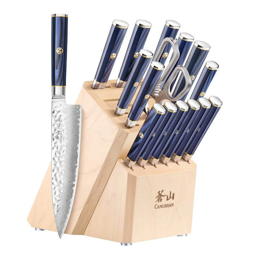17-piece knife set with blue handles in a light wood block, including a large chef's knife and kitchen shears.