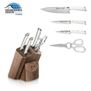 
                    
                      Knife set with wooden block, featuring four knives and kitchen shears, 2017 Housewares Design Awards finalist.
                    
                  