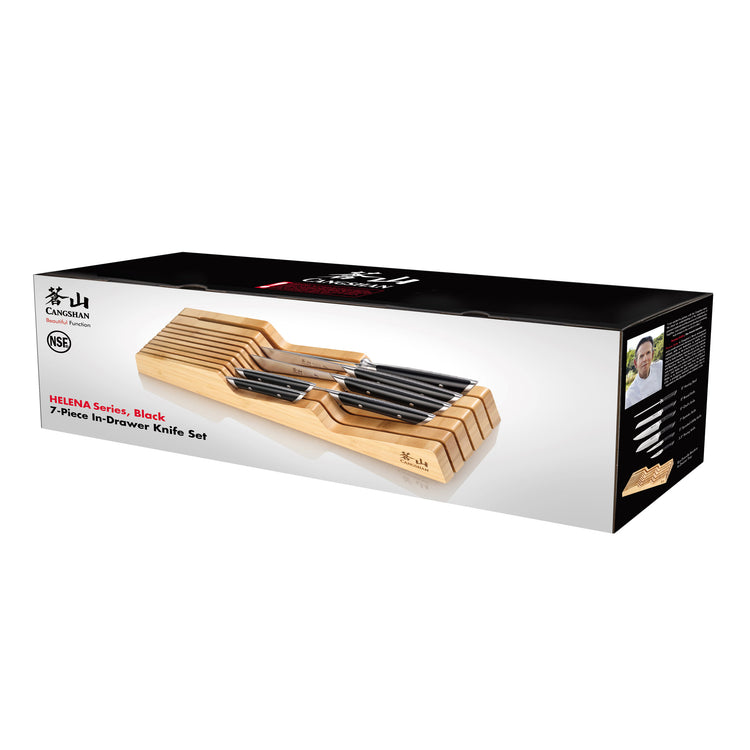 7-piece knife set with black handles stored in a bamboo in-drawer block on product packaging box.
