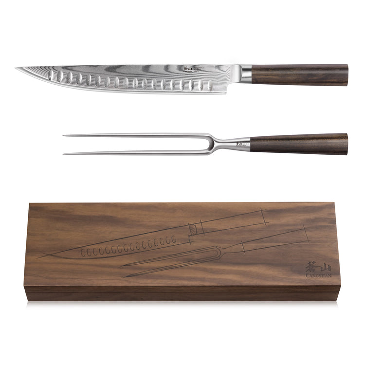 Two-piece carving set with Damascus steel blade and fork, dark wooden handles, and matching wooden storage box.