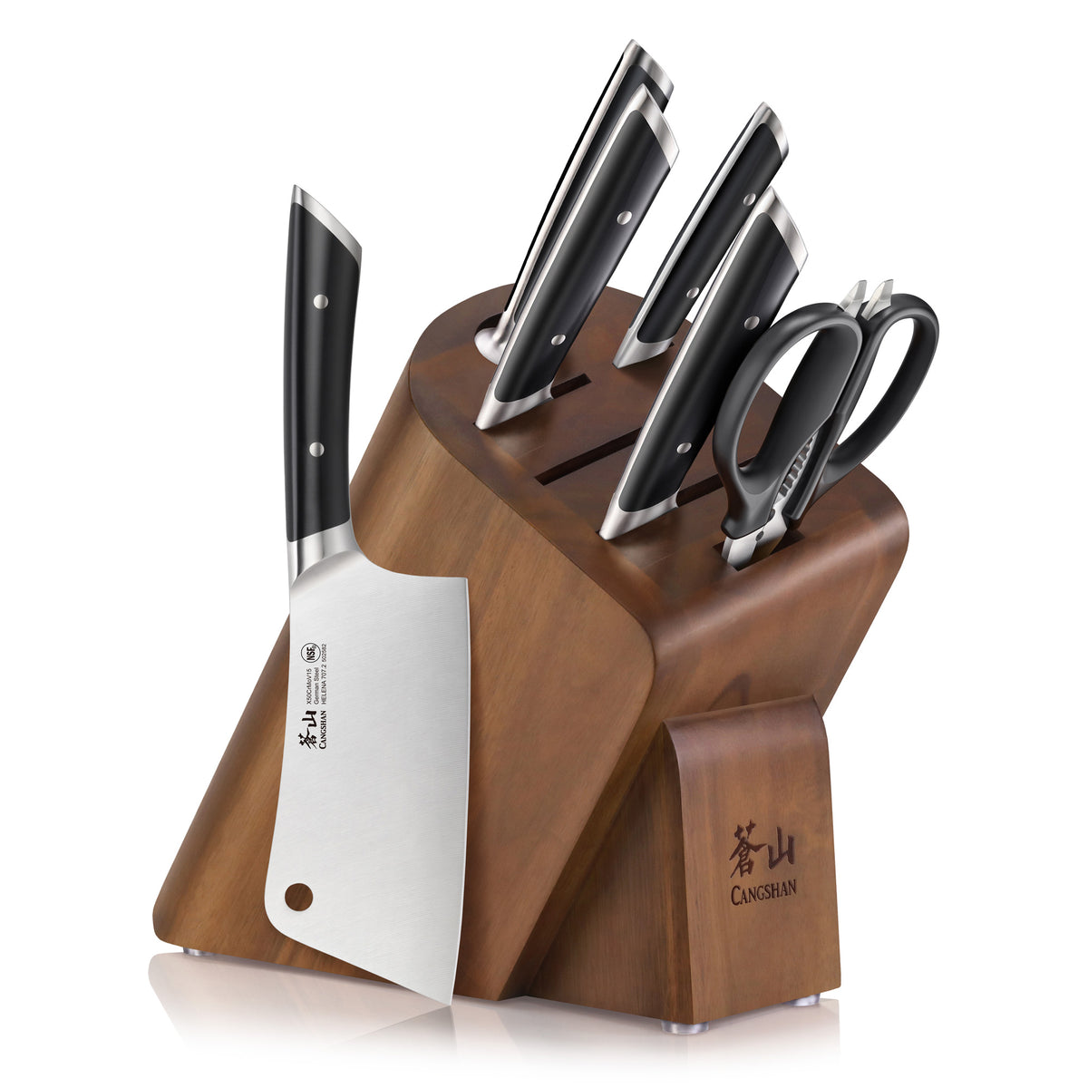Wooden knife block holding five knives with black handles and a pair of kitchen scissors.