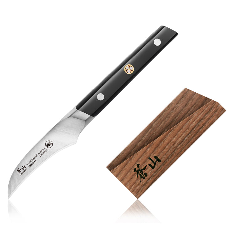 Japanese paring knife with black handle and wooden sheath with Japanese characters.