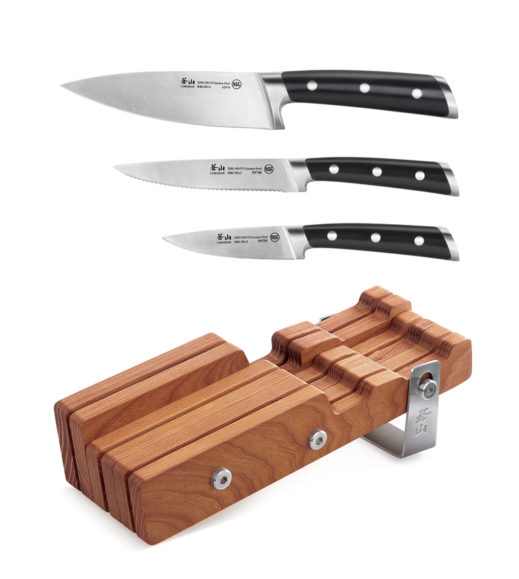 Three forged German steel knives with black handles and a wooden ash wood knife block with metal stand.