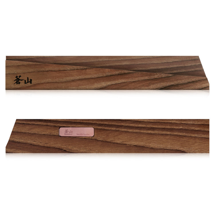 Solid ash wood magnetic knife sheath with angled edges and engraved Japanese characters on one side.