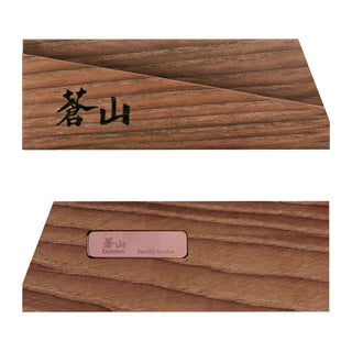 
                    
                      Solid ash wood magnetic knife sheath with Japanese characters on one side and a metal label on the back.
                    
                  
