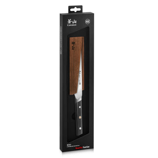 
                    
                      Chef knife with wooden handle in black rectangular packaging labeled "Cangshan.
                    
                  