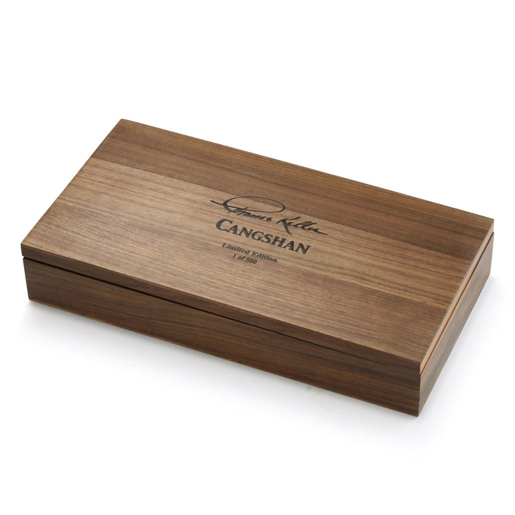 Closed rectangular wooden box with engraved text and signature on the lid.