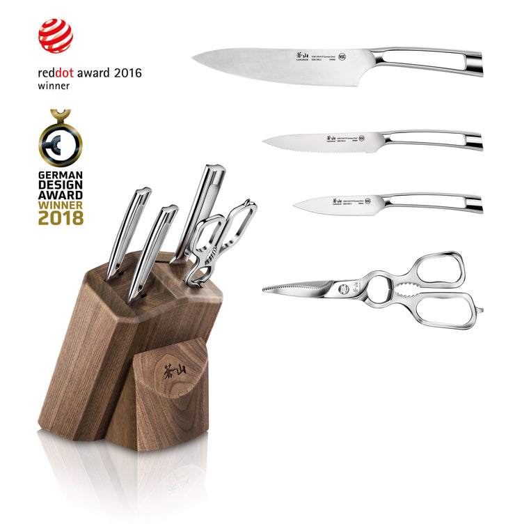 Walnut knife block holding four stainless steel knives and kitchen shears, with three knives and shears displayed separately.